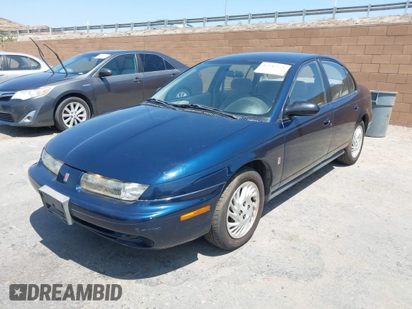 1998 Saturn SL z VIN 1G8ZK5270WZ174447, wystawiony jako IAAI lot #42543578 z przebiegiem 137 326 mil mil oraz . Historia ofert i sprzedaży dostępna na DreamBid. Obrazek 2.