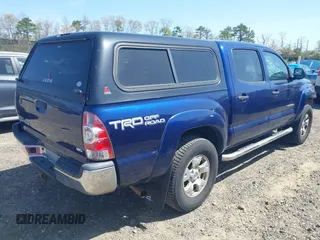 2014 Toyota Tacoma with VIN 3TMLU4EN4EM154261, listed as a IAAI auction lot 42119237 with 211,929 mi miles and . Bid and sale history available at DreamBid. Image 4.