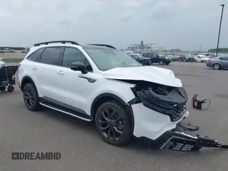 2022 Kia Sorento SX z VIN 5XYRKDLFXNG111374, wystawiony jako IAAI lot #42275809 z przebiegiem 38 212 mil mil oraz . Historia ofert i sprzedaży dostępna na DreamBid. Obrazek 1.