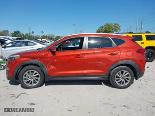 2016 Hyundai Tucson Limited with VIN KM8J33A23GU127742, listed as a IAAI auction lot 41796947 with 115,758 mi miles. Bid and sale history available at carsss.com. Image 14.