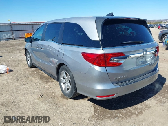 2018 Honda Odyssey EX-L with VIN 5FNRL6H71JB077112, listed as a IAAI auction lot 41721523 with 70,893 mi miles. Bid and sale history available at carsss.com. Image 3.