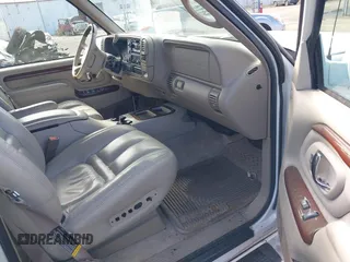 1999 Cadillac Escalade with VIN 1GYEK13R0XR415674, listed as a IAAI auction lot 40003144 with 80,959 mi miles and . Bid and sale history available at DreamBid. Image 5.