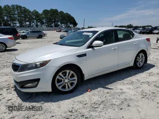 2013 Kia Optima EX с VIN 5XXGN4A71DG238043, выставлен на аукционе Copart как лот 62005815 с пробегом 118 519 миль миль и Списание • Salvage title. История ставок и продаж доступна на DreamBid. Изображение 1.