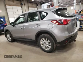 2013 Mazda CX-5 Sport z VIN JM3KE2BE4D0137115, wystawiony jako Copart lot #54487795 z przebiegiem 154 111 mil mil oraz Szkoda całkowita • Salvage title. Historia ofert i sprzedaży dostępna na DreamBid. Obrazek 2.
