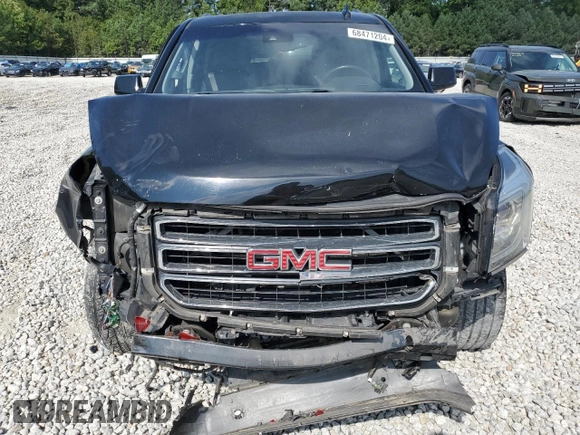 2015 GMC Yukon SLT with VIN 1GKS2BKC2FR666386, listed as a Copart auction lot 68471204 with 154,041 mi miles and Salvage Title. Bid and sale history available at carsss.com. Image 5.