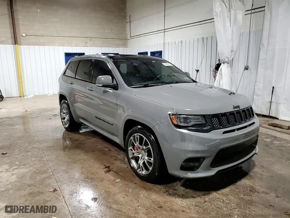 2021 Jeep Grand Cherokee SRT with VIN 1C4RJFDJ5MC667774, listed as a Copart auction lot 42484435 with 43,387 mi miles and Salvage Title. Bid and sale history available at carsss.com. Image 14.