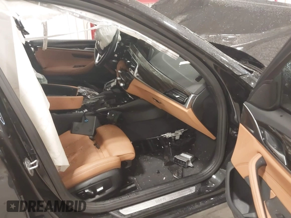 2022 BMW 5 Series 540i xDrive with VIN WBA73BJ09NWX56346, listed as a IAAI auction lot 41476038 with Not provided miles and . Bid and sale history available at DreamBid. Image 5.