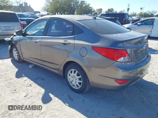 2014 Hyundai Accent GLS with VIN KMHCT4AE6EU639694, listed as a IAAI auction lot 41674605 with 101,549 mi miles and . Bid and sale history available at carsss.com. Image 3.