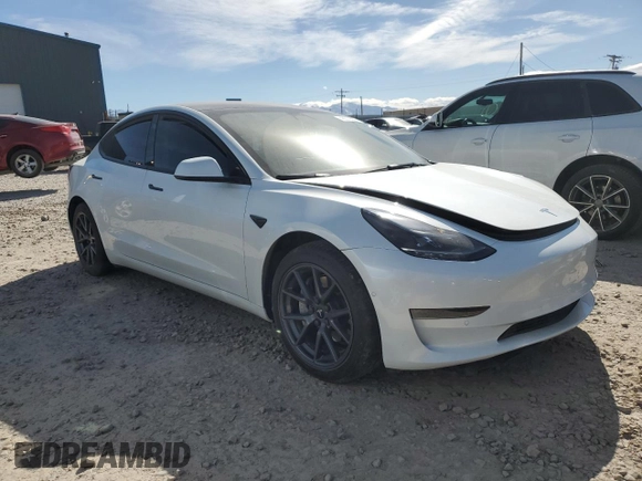 2022 Tesla Model 3 Long Range with VIN 5YJ3E1EB4NF317528, listed as a Copart auction lot 48573565 with 30,541 mi miles and Salvage Title. Bid and sale history available at carsss.com. Image 4.
