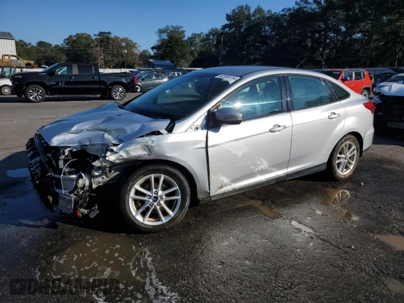 2017 Ford Focus SE with VIN 1FADP3F28HL315779, listed as a Copart auction lot 82608154 with 143,902 mi miles and Salvage title. Bid and sale history available at DreamBid. Image 1.