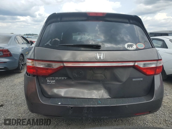 2012 Honda Odyssey Touring with VIN 5FNRL5H94CB102177, listed as a Copart auction lot 55942185 with 179,418 mi miles and Salvage Title. Bid and sale history available at DreamBid. Image 6.
