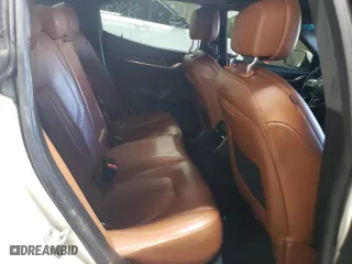 2014 Maserati Ghibli S Q4 with VIN ZAM57RTA4E1117703, listed as a Copart auction lot 48754515 with 104,284 mi miles and Salvage Title. Bid and sale history available at carsss.com. Image 10.