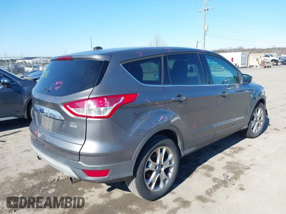 2013 Ford Escape SEL with VIN 1FMCU9H93DUA72572, listed as a IAAI auction lot 41633096 with 190,816 mi miles. Bid and sale history available at carsss.com. Image 4.