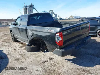 2016 Toyota Tundra 4WD Truck SR with VIN 5TFUM5F16GX064418, listed as a IAAI auction lot 41504912 with 215,241 mi miles. Bid and sale history available at carsss.com. Image 3.