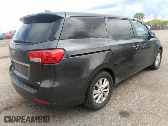 2017 Kia Sedona LX with VIN KNDMB5C18H6218659, listed as a IAAI auction lot 42135552 with 157,263 mi miles. Bid and sale history available at carsss.com. Image 4.