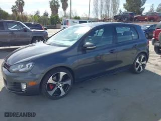2013 Volkswagen GTI with VIN WVWHD7AJ2DW132851, listed as a IAAI auction lot 42021650 with 83,473 mi miles. Bid and sale history available at carsss.com. Image 2.