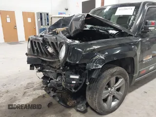 2014 Jeep Patriot Latitude with VIN 1C4NJPFA9ED887903, listed as a IAAI auction lot 41228274 with 82,225 mi miles and . Bid and sale history available at carsss.com. Image 6.