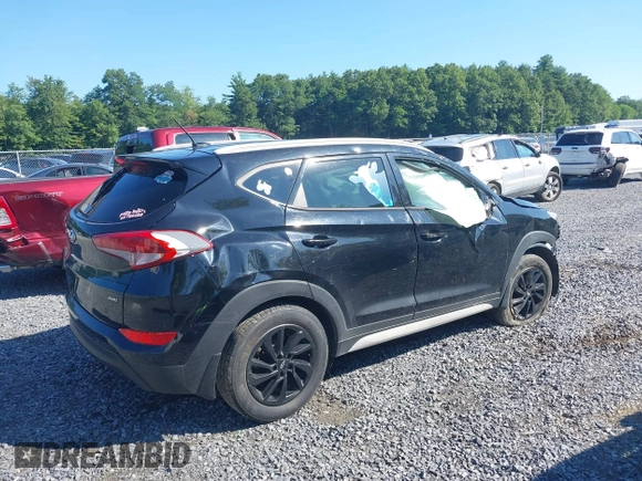 2017 Hyundai Tucson SE with VIN KM8J3CA41HU403662, listed as a IAAI auction lot 39867347 with 151,980 mi miles. Bid and sale history available at carsss.com. Image 4.