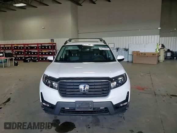 2023 Honda Ridgeline RTL with VIN 5FPYK3F56PB037672, listed as a Copart auction lot 56315435 with 26,550 mi miles and Salvage title. Bid and sale history available at DreamBid. Image 14.