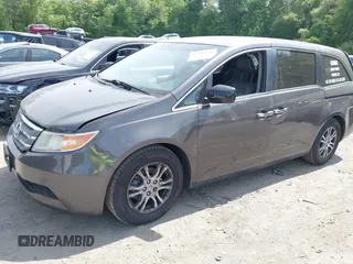 2012 Honda Odyssey EX-L with VIN 5FNRL5H63CB037697, listed as a IAAI auction lot 42262596 with 135,218 mi miles and . Bid and sale history available at DreamBid. Image 17.