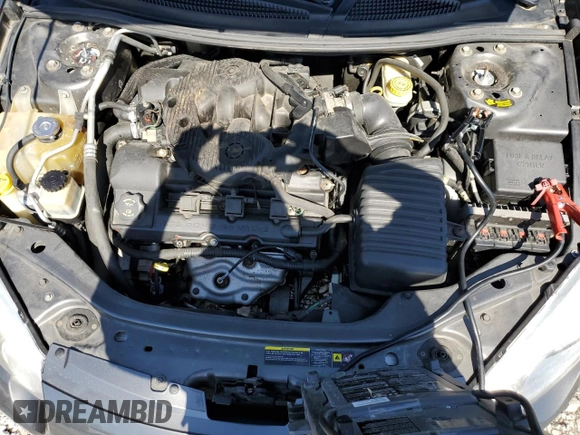 2005 Chrysler Sebring Touring z VIN 1C3EL55R45N685555, wystawiony jako Copart lot #53227955 z przebiegiem 95 492 mil mil oraz Szkoda całkowita • Salvage title. Historia ofert i sprzedaży dostępna na DreamBid. Obrazek 11.