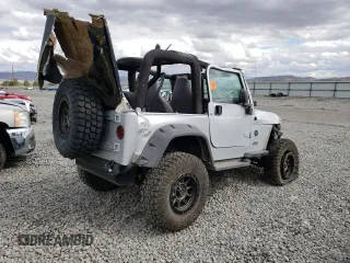 2003 Jeep Wrangler Sport with VIN 1J4FA49SX3P369375, listed as a Copart auction lot 71309184 with 0 mi miles and Salvage Title. Bid and sale history available at carsss.com. Image 3.
