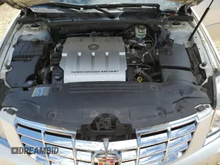2008 Cadillac DTS 1SE z VIN 1G6KD57998U155183, wystawiony jako Copart lot #70440454 z przebiegiem 189 712 mil mil oraz Szkoda całkowita • Salvage title. Historia ofert i sprzedaży dostępna na DreamBid. Obrazek 11.