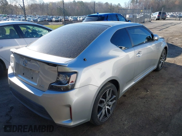 2014 Scion tC with VIN JTKJF5C74E3088669, listed as a IAAI auction lot 41891175 with 86,160 mi miles. Bid and sale history available at carsss.com. Image 4.