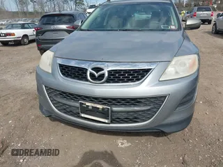 2010 Mazda CX-9 Touring with VIN JM3TB3MVXA0227428, listed as a IAAI auction lot 42055757 with 252,858 mi miles and . Bid and sale history available at DreamBid. Image 6.