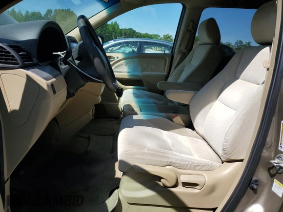 2010 Honda Odyssey LX с VIN 5FNRL3H22AB062671, выставлен на аукционе Copart как лот 57466735 с пробегом 193 274 миль миль и Списание • Salvage title. История ставок и продаж доступна на DreamBid. Изображение 7.