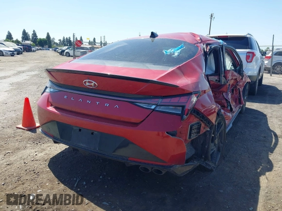 2021 Hyundai Elantra N Line z VIN KMHLR4AF7MU147407, wystawiony jako IAAI lot #42313077 z przebiegiem 124 298 mil mil oraz . Historia ofert i sprzedaży dostępna na DreamBid. Obrazek 4.