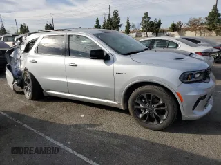 2023 Dodge Durango R/T Plus z VIN 1C4SDHCTXPC685988, wystawiony jako Copart lot #87110694 z przebiegiem 15 216 mil mil oraz Szkoda całkowita • Salvage title. Historia ofert i sprzedaży dostępna na DreamBid. Obrazek 4.