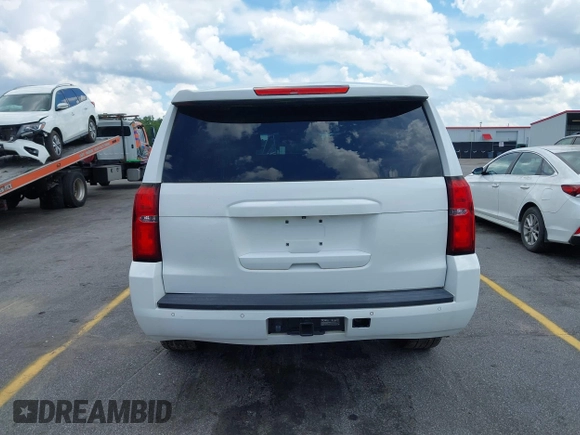 2015 Chevrolet Tahoe Commercial z VIN 1GNLC2EC1FR721538, wystawiony jako IAAI lot #42274601 z przebiegiem 138 991 mil mil oraz . Historia ofert i sprzedaży dostępna na DreamBid. Obrazek 16.
