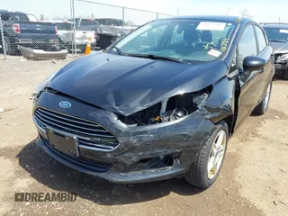 2019 Ford Fiesta SE with VIN 3FADP4BJ2KM165435, listed as a IAAI auction lot 42077508 with 118,784 mi miles. Bid and sale history available at carsss.com. Image 6.