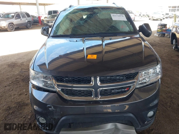2019 Dodge Journey SE z VIN 3C4PDCBG9KT798938, wystawiony jako IAAI lot #42174970 z przebiegiem Nie podano mil oraz . Historia ofert i sprzedaży dostępna na DreamBid. Obrazek 11.