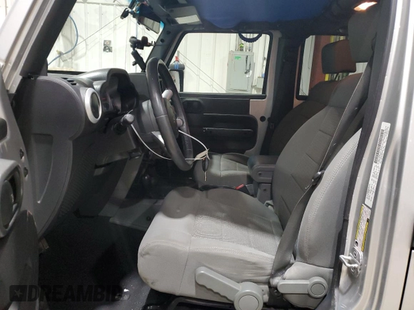 2008 Jeep Wrangler Unlimited Sahara with VIN 1J4GA59148L652001, listed as a Copart auction lot 48599655 with 161,436 mi miles and Clean title. Bid and sale history available at DreamBid. Image 7.
