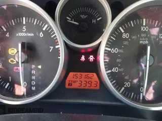 2006 Mazda MX-5 Miata Touring z VIN JM1NC25F960112536, wystawiony jako IAAI lot #41868290 z przebiegiem 153 162 mil mil oraz . Historia ofert i sprzedaży dostępna na DreamBid. Obrazek 7.