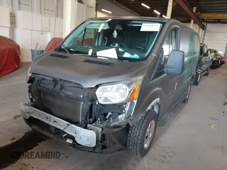 2020 Ford Transit Cargo z VIN 1FTBR1Y87LKA77794, wystawiony jako IAAI lot #41808611 z przebiegiem 70 047 mil mil oraz . Historia ofert i sprzedaży dostępna na DreamBid. Obrazek 23.