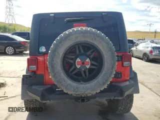 2018 Jeep Wrangler JK Unlimited Sport S with VIN 1C4HJWDG4JL898662, listed as a Copart auction lot 69213864 with 52,773 mi miles and Salvage Title. Bid and sale history available at carsss.com. Image 6.