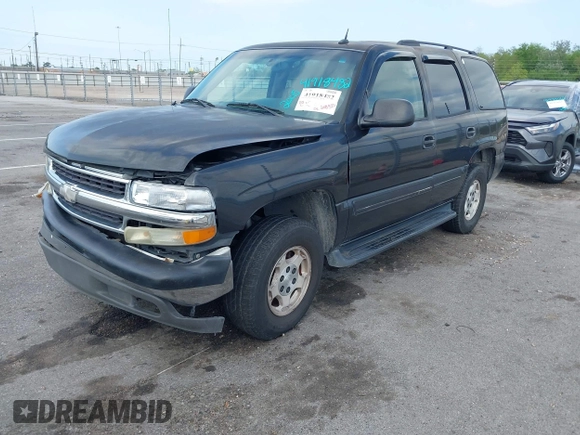 2005 Chevrolet Tahoe LS with VIN 1GNEC13V35R263104, listed as a IAAI auction lot 41918482 with 208,520 mi miles and . Bid and sale history available at DreamBid. Image 2.