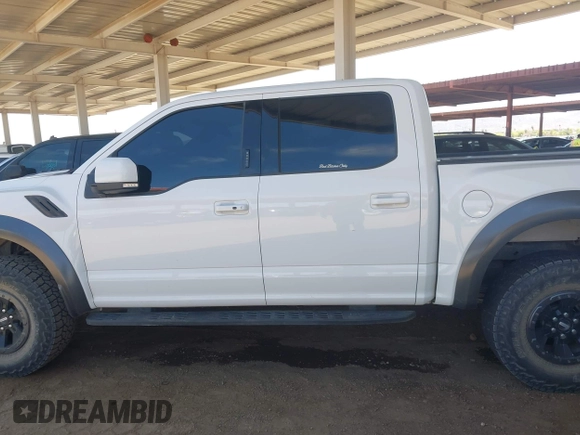 2017 Ford F-150 Raptor with VIN 1FTFW1RG7HFA84244, listed as a IAAI auction lot 42175442 with 123,009 mi miles and . Bid and sale history available at carsss.com. Image 14.