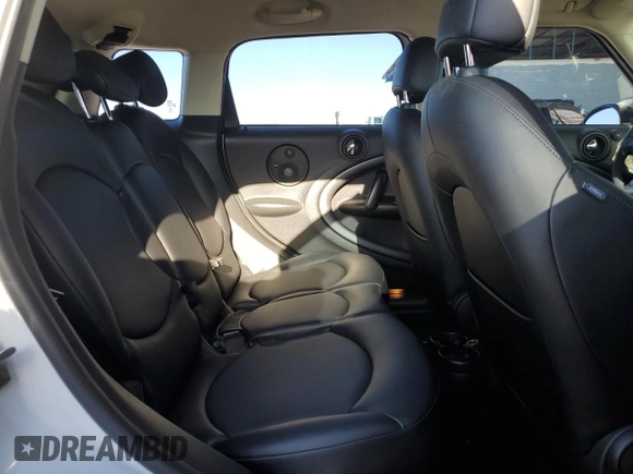 2015 MINI Countryman S with VIN WMWZC5C53FWP44388, listed as a Copart auction lot 54560585 with 67,913 mi miles and Salvage Title. Bid and sale history available at DreamBid. Image 10.