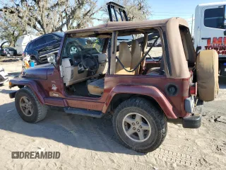 2001 Jeep Wrangler Sahara with VIN 1J4FA59S61P335016, listed as a Copart auction lot 83019614 with 0 mi miles and Salvage Title. Bid and sale history available at carsss.com. Image 2.