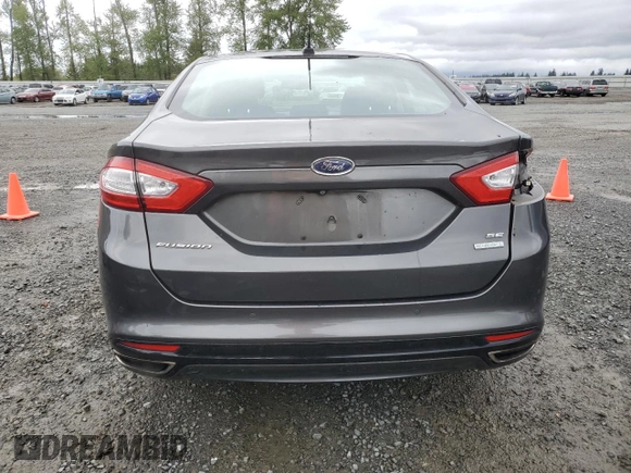 2015 Ford Fusion SE z VIN 3FA6P0H95FR206535, wystawiony jako Copart lot #54242105 z przebiegiem 83 001 mil mil oraz Szkoda całkowita • Salvage title. Historia ofert i sprzedaży dostępna na DreamBid. Obrazek 6.