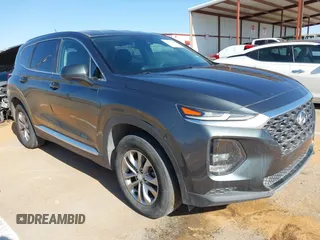 2019 Hyundai Santa Fe SE with VIN 5NMS23AD2KH134016, listed as a IAAI auction lot 41977240 with 61,448 mi miles. Bid and sale history available at carsss.com. Image 1.
