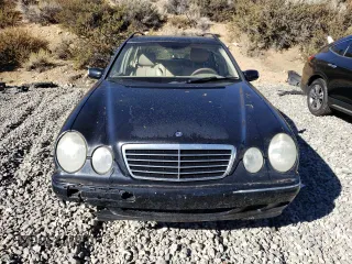 2002 Mercedes-Benz E-Class with VIN WDBJH82J42X066433, listed as a Copart auction lot 75933054 with 134,476 mi miles and Clean Title. Bid and sale history available at carsss.com. Image 5.