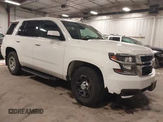 2015 Chevrolet Tahoe Commercial z VIN 1GNSK2EC5FR688820, wystawiony jako IAAI lot #41444813 z przebiegiem 206 244 mil mil oraz . Historia ofert i sprzedaży dostępna na DreamBid. Obrazek 1.