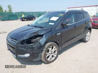 2015 Ford Escape Titanium with VIN 1FMCU9J96FUB58519, listed as a IAAI auction lot 42429369 with 125,541 mi miles and . Bid and sale history available at DreamBid. Image 2.