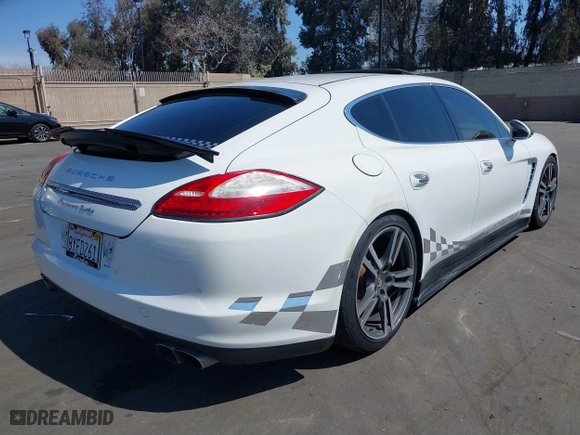 2011 Porsche Panamera Turbo with VIN WP0AC2A7XBL091024, listed as a IAAI auction lot 41841471 with 64,722 mi miles. Bid and sale history available at carsss.com. Image 4.