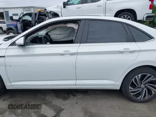 2020 Volkswagen Jetta SEL z VIN 3VWEB7BU4LM008013, wystawiony jako IAAI lot #42182821 z przebiegiem 66 118 mil mil oraz . Historia ofert i sprzedaży dostępna na DreamBid. Obrazek 14.